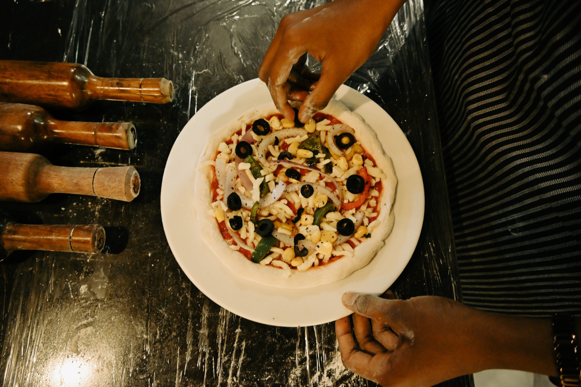 Stretching the Base and Choosing Your Toppings Feels Like Pure Creativity