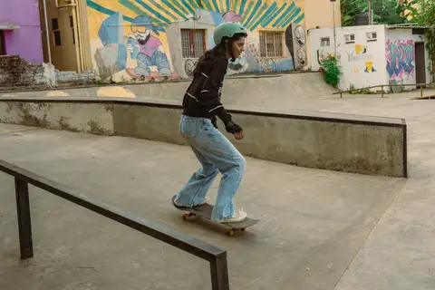 Safety gear and skateboard included.