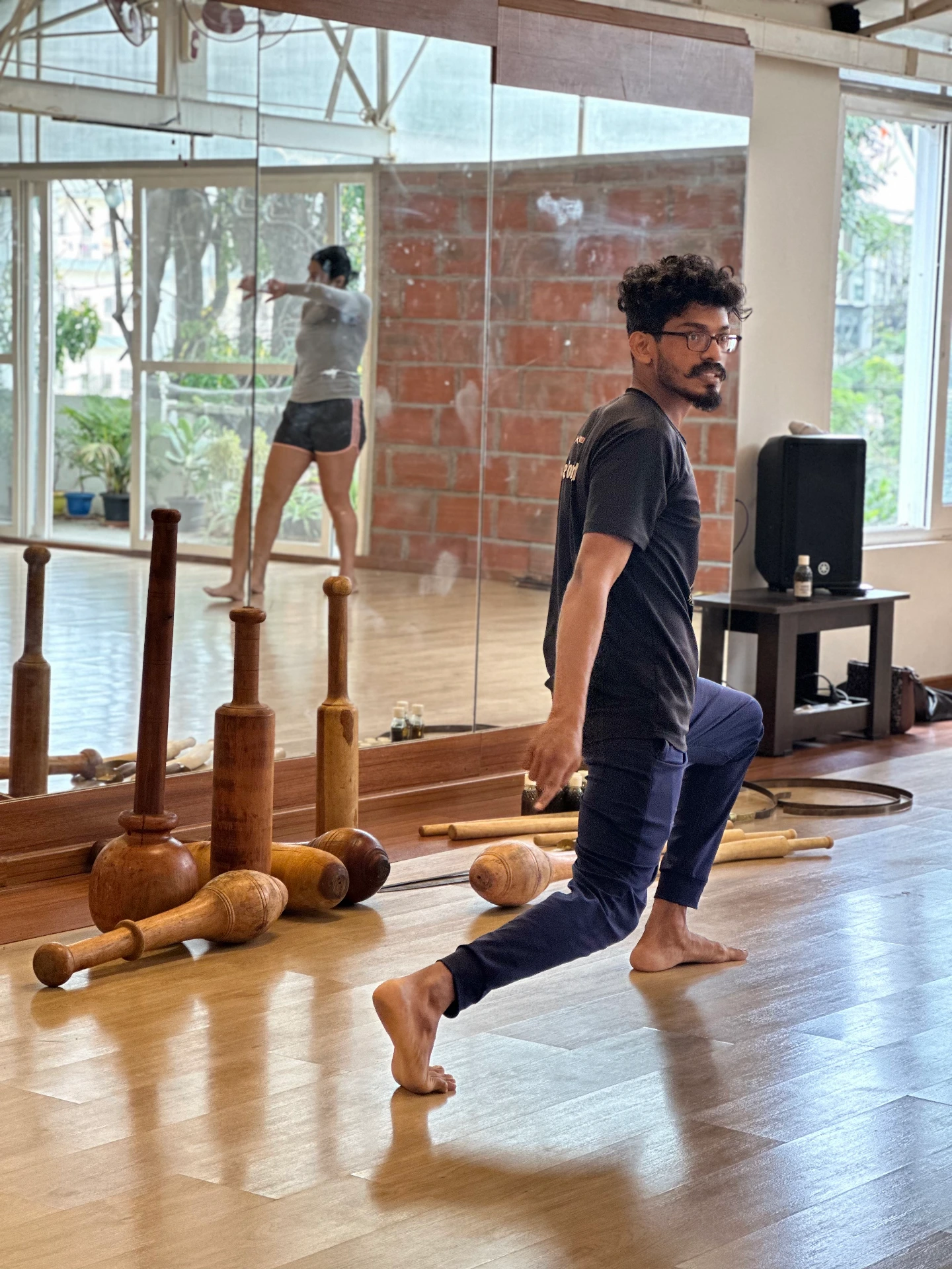 Feeling the rhythm with Kalari movements and wooden weapons